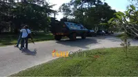 Aparat kepolisian terdiri dari Densus 88 Anti-Teror dan Brimob disertai dengan mobil Baracuda, mendatangi Gelanggang Mahasiswa FISIP Universitas Riau, Sabtu, 2 Juni 2018, di Kampus Bina Widya, Panam, Pekanbaru. (Riauonline.co.id)