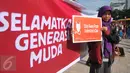 Seorang wanita ikut menolak Valentine Day di Kawasan Bundaran HI, Jakarta, Minggu (14/2/2016). Mereka menilai perayaan Valentine Day kerap menjurus pada perilaku seks bebas dan merusak moral. (Liputan6.com/Gempur M Surya)