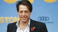 Aktor Love Actually ini juga belum menikah. Kendati demikian, Hugh Grant, miliki anak dari Elizabeth Hurley yang sempat dikencani selama 13 tahun. Ia pun sudah punya satu anak lagi dari Tinglan Hong. (ODD ANDERSEN / AFP)