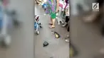 Beredar rekaman video, ada sebuah labu yang tumbuh di celah aspal jalan di China.
