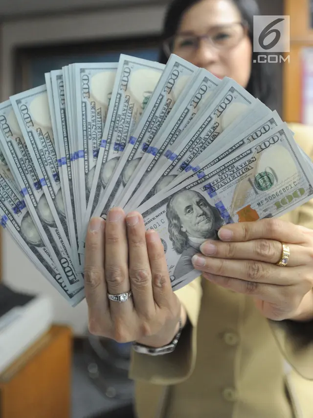 Rupiah Tembus 14.600 per Dolar AS