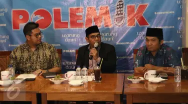 Putera Betawi, Biem Benyamin (tengah) menjadi pembicara pada diskusi 'Kontestasi Pilkada DKI' di Jakarta, Sabtu (12/3). Politikus Partai Gerindra itu memprediksi, Pilkada DKI 2017 tidak akan ada calon yang maju independen. (Liputan6.com/Gempur M Surya)