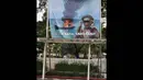 Gambar yang pernah membuat Menteri Susi tertawa ini dicetak besar dan dipajang di halaman kantor Kementerian Kelautan dan Perikanan (KKP), Jakarta. Foto diambil pada Kamis (11/12/2014). (Liputan6.com/Miftahul Hayat)