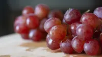 Ilustrasi buah anggur (dok.unsplash/Jene Yeo)