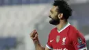 Mohamed Salah dari Liverpool merayakan golnya ke gawang Atalanta selama pertandingan Liga Champions grup D di Stadion Gewiss pada 3 November 2020. Federasi Sepak Bola Mesir melaporkan, Jumat (13/11/2020), Mohamed Salah dinyatakan positif Covid-19 saat membela Timnas Mesir. (AP Photo/Luca Bruno)