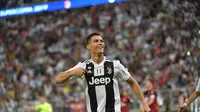 6. Selebrasi gol Ronaldo usai mencetak gol pada laga Final Piala Super Italia yang berlangsung di stadion King Abdullah Sports City, Jeedah, Kamis (17/1). Juventus menang 1-0  atas AC Milan (AFP/Giuseppe Cacace)