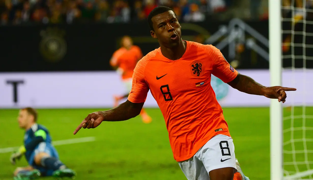 2. Georginio Wijnaldum - Keberhasilan Liverpool meraih gelar Liga Champions musim lalu tidak lepas dari performa apiknya di lini tengah. Mantan gelandang PSV Eindoven itu penampilannya kian matang memasuki usai ke 28 tahun. (AFP/Patrik Stollarz)