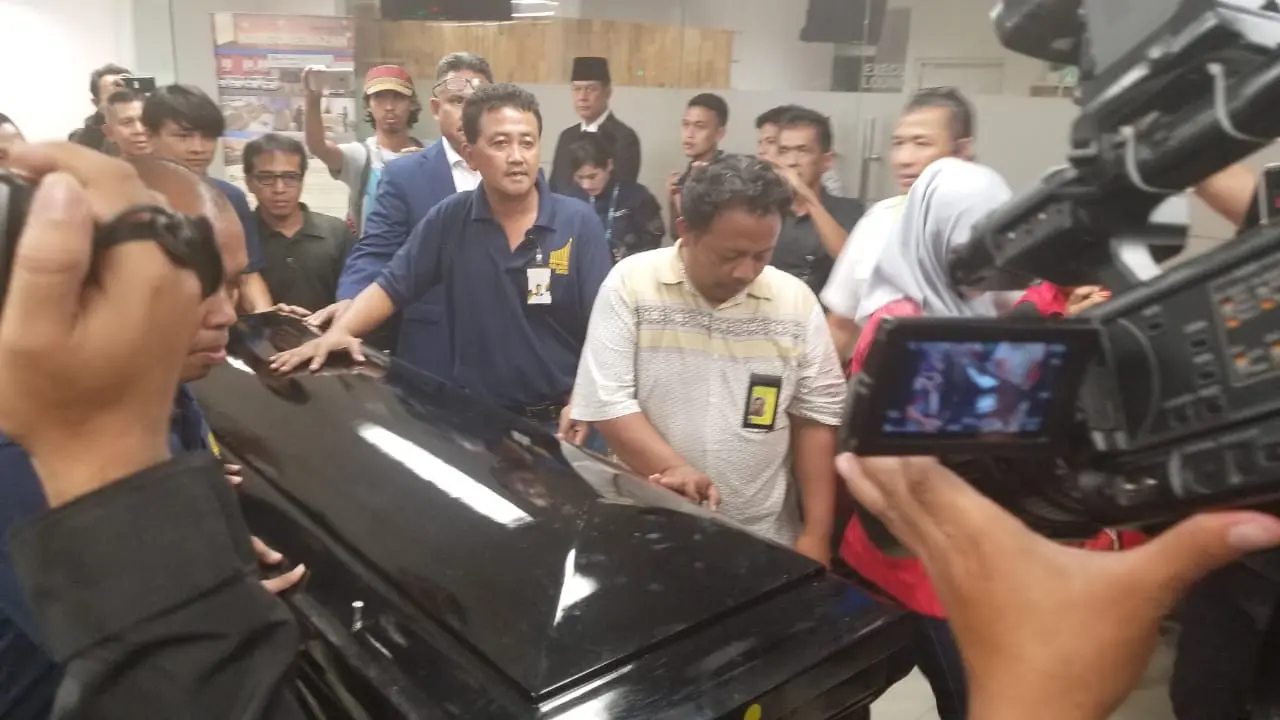 peti jenazah Sutopo tiba di Tanah Air. (Liputan6.com/Pramita Prastiwi)