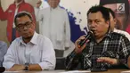 Direktur Hukum dan Advokasi TKN 01, Irfan Pulungan (kanan) memberi keterangan pers di Media Center Cemara Jakarta, Selasa (25/6/2019). Siaran Pers tersebut mengenai: Menyongsong Keputusan MK atas Sidang Sengketa Pilpres 27 Juni 2019. (Liputan6.com/Angga Yuniar)