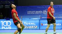 Tontowi Ahmad/Liliyana Natsir gagal melenggang ke babak final Malaysia Terbuka Super Series Premier 2017 setelah takluk dari ganda China, Lu Kai/Huang Yaqiong, di Stadion Perpaduan, Sabtu (8/4/2017). (Humas PBSI)