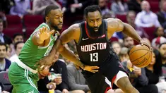 Pebasket Houston Rockets, James Harden, berusaha melewati pebasket Boston Celtics, Kemba Walker, pada laga NBA Rabu (12/2/2020). Houston Rockets menang 116-105 atas Boston Celtics. (AP/David J. Phillip)