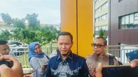 Wakil Ketua DPRD Riau Agung Nugroho memberi keterangan usai diperiksa Polda Riau terkait korupsi SPPD. (Liputan6.com/M Syukur)