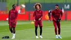 Pemain Manchester United Kobbie Mainoo (kiri), Hannibal Mejbri (tengah), dan Marcus Rashford (kanan) menghadiri sesi latihan tim di Trafford Training Center, Carrington, Inggris, Senin (23/10/2023). Manchester United bermain melawan Copenhagen dalam pertandingan sepak bola Grup A Liga Champions. (Nick Potts/PA via AP)