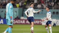 Pemain Timnas Inggris, Jack Grealish melakukan selebrasi usai mencetak gol keenam ke gawang Timnas Iran dalam laga matchday pertama Grup B Piala Dunia 2022 di Khalifa International Stadium, Doha, Qatar, Senin(21/11/2022) malam WIB. (AP/Abbie Parr)