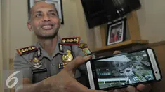 Kapolres Jakarta Pusat Kombes Pol Hendro Pandowo, memberikan keterangan pers kepada wartawan terkait  lubang yang terlihat di lantai 8 gedung MNC Financial Center, Jakarta, Selasa (7/7/2015). (Liputan6.com/Herman Zakharia)