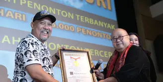 Film Warkop DKI Reborn tercatat dalam Museum Rekor Indonesia (MURI). Tidak tanggung-tanggung, film itu mendapatkan dua rekor sekaligus. Sebagai Penonton Terbanyak dan Jumlah Penonton Tercepat. (Adrian Putra/Bintang.com)