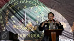 Kapolri Jendral Tito Karnavian memberikan sambutan di acara pembukaan Kongres III PSNU di TMII, Jakarta, Rabu (3/5). Dalam kongres tersebut Kapolri menghimbau untuk menjaga Kesatuan NKRI dalam Pencak Silat. (Liputan6.com/Johan Tallo)