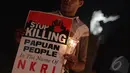 aktivis dari "Papua Itu Kita" mendesak Komnas HAM membentuk komisi penyelidikan pelanggaran HAM yang independen, Jakarta, Kamis (18/12/2014). (Liputan6.com/Faizal Fanani)