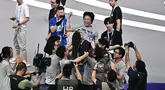 Hephaestus Universitas Tsinghua keluar sebagai juara dalam cabang olahraga sepak bola 5v5 di World Humanoid Robot Games. (AFP/Pedro Pardo)