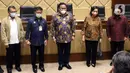 (kanan ke kiri) Menteri BUMN Erick Thohir, Menkeu Sri Mulyani Indrawati, Wakil Ketua DPR Rachmat Gobel, Mentan Syahrul Yasin Limpo, dan Menteri ESDM Arifin Tasrif foto bersama sebelum rapat konsultasi masalah pupuk subsidi di Kompleks Parlemen, Jakarta, Selasa (9/2/2021). (Liputan6.com/Angga Yuniar)