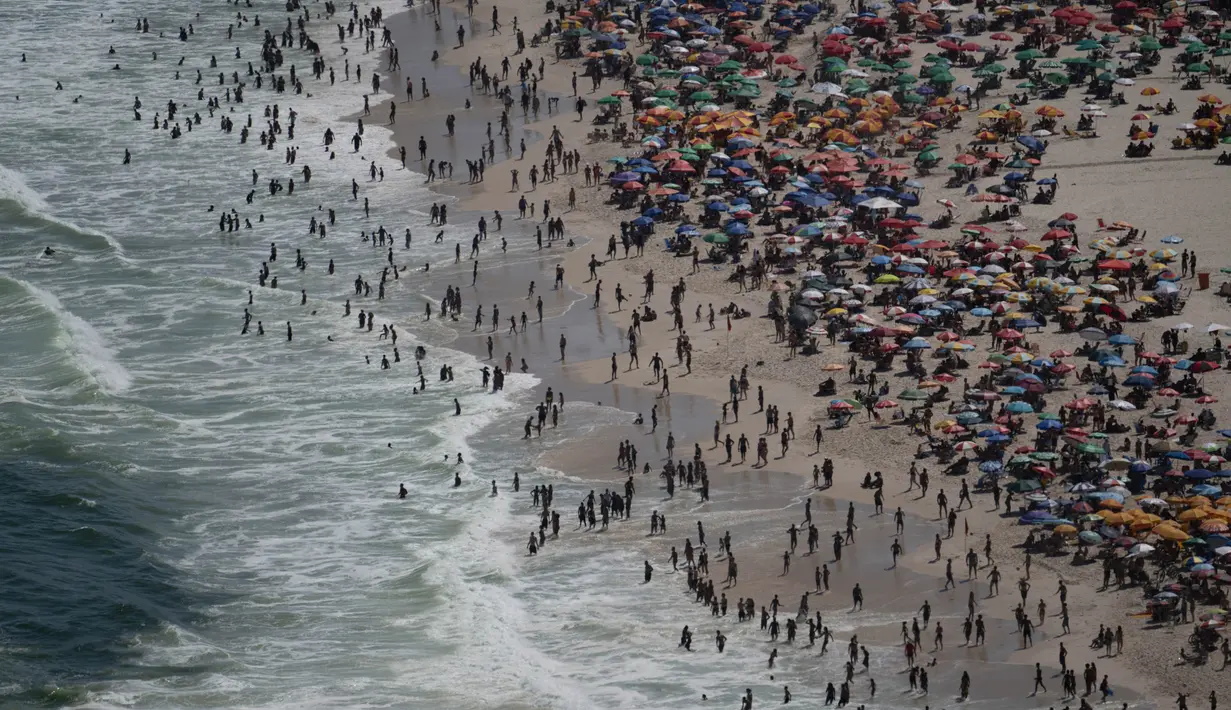 Di negara bagian Rio Grande do Sul, Brasil bagian selatan, cuaca panas memaksa pemerintah setempat menunda kembalinya kegiatan belajar mengajar. (Pablo PORCIUNCULA/AFP)