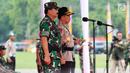 Panglima TNI Marsekal Hadi Tjahjanto dan Kapolri Jenderal Tito Karnavian memimpin Apel Kesiapan Natal, Tahun Baru 2019 serta menjelang Pemilu legislasi dan Presiden 2019 di lapangan silang Monas, Jakarta, Jumat (30/11). (Liputan6.com/Johan Tallo)