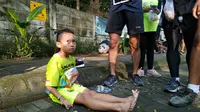 Bocah 7 tahun mengalahkan ribuan peserta Pemilu Run 2019 di Kediri. (Liputan6.com/Dian Kurniawan)