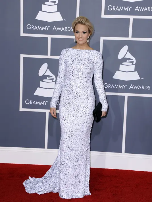 Carrie mengaku senang dapat aktif dengan melakukan C-section, menunggu 6 minggu sebelum berolahraga. Dalam 10 hari, ia bisa mulai berjalan perlahan di atas treadmill dan di sekitar rumahnya. (Bintang/EPA)