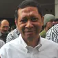 Direktur Utama PT Pelindo II, Richard Joost Lino menuju mobil yang menjemputnya usai menjalani pemeriksaan di Bareskrim Mabes Polri, Jakarta, (18/11/2015). RJ Lino diperiksa selama 6 jam dengan 12 pertanyaan. (Liputan6.com/Gempur M Surya)