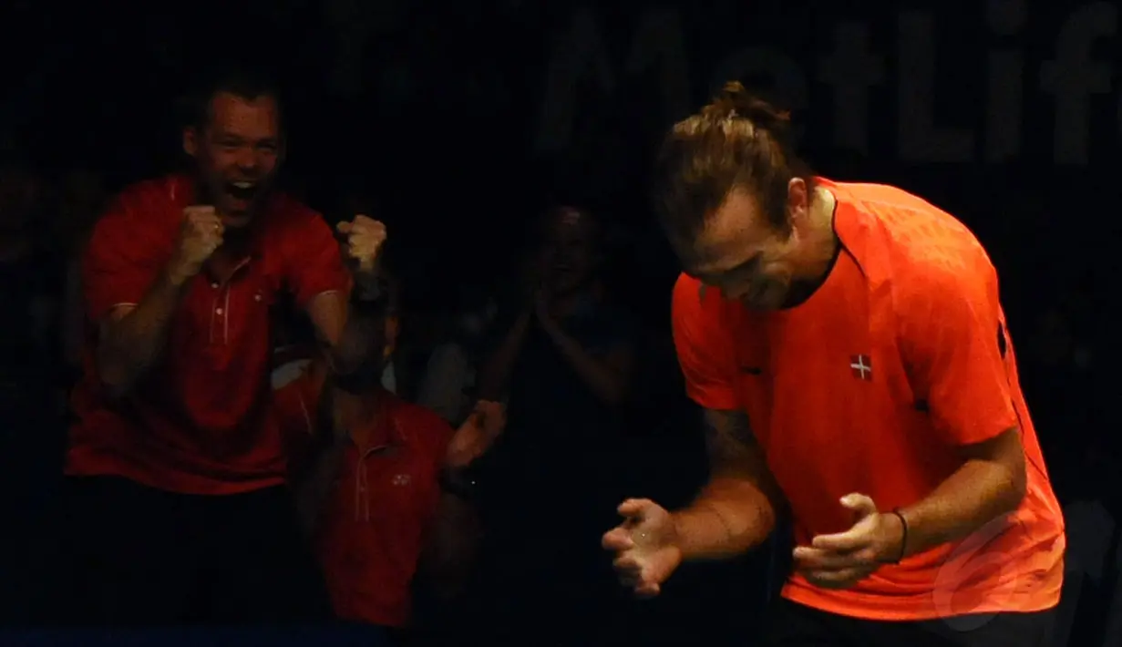 Juara tunggal putra Indonesia Open 2014 diraih Jan O Jorgensen (Denmark) setelah di final menumbangkan Kenichi Tago (Jepang), (22/6/2014). (Liputan6.com/Helmi Fithriansyah)