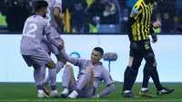 Cristiano Ronaldo masih belum mampu mencetak gol bersama Al Nassr, kali ini di ajang&nbsp;Saudi Super Cup. Alhasil, Al Nassr takluk 1-3 dari&nbsp;Al Ittihad pada laga semifinal Saudi Super Cup di&nbsp;King Fahd Stadium, Jumat (27/1/2023) dini hari WIB. (AFP/Fayez NURELDINE)