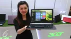 Model menunjukan produk terbaru notebook Acer di Jakarta, Rabu (22/6). Produk ini juga telah  menggunakan prosesor intel generasi ke-6. (Liputan6.com/Angga Yuniar)