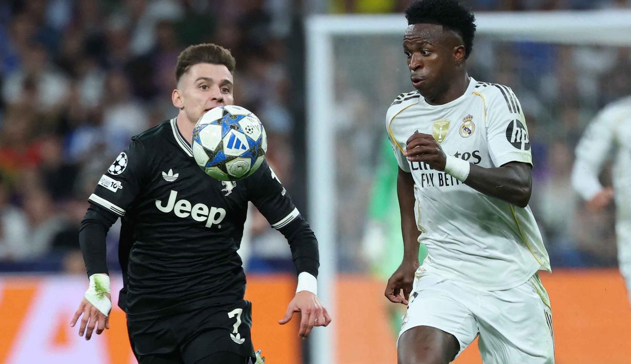 Keunggulan Real Madrid atas Juventus bertahan hingga akhir pertandingan. (Thomas COEX/AFP)