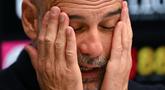 Kekecewaan tak mampu ditutupi pelatih Pep Guardiola setelah gagal membawa Manchester City menjadi juara Liga Inggris 2025/2026. (AFP/Glyn Kirk)