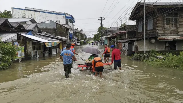 FOTO: Badai Tropis Agaton Sebabkan Banjir dan Tanah Longsor di Filipina