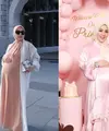 Detik-detik terakhir sebelum melahirkan, Syahrini membagikan foto OOTD bumil terakhirnya. Syahrini tampil elegan dengan dua busana berbeda, yakni dengan serba pink dan nude [@princessyahrini]