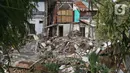 Kondisi rumah amblas di bantaran kali Ciliwung kawasan Matraman Dalem, Jakarta, Selasa (3/3/2020). Rumah amblas akibat hujan lebat yang mengguyur Ibu kota. (Liputan6.com/Hermaan Zakharia)