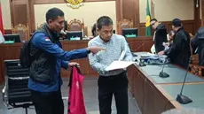 Mantan Ketua Ombudsman, Hery Susanto saat menjalani persidangan di Pengadilan Tipikor, Jakarta, Kamis (25/6/2026). (Foto: Liputan6.com/Rifqy Alief).