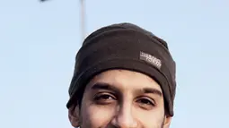 Foto tak bertanggal menunjukkan wajah Abdelhamid Abaaoud yang dimuat majalah online Dabiq. Pria yang merupakan warga negara Belgia ini dicurigai sebagai otak di balik aksi teror di Paris. (REUTERS/Social Media Website)