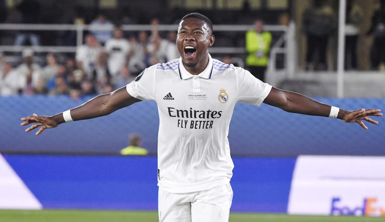 Pemain Real Madrid, David Alaba, melakukan selebrasi setelah mencetak gol ke gawang Eintracht Frankfurt pada Laga UEFA Super Cup, di Helsinki, (10/8/2022). Mantan pemain Bayern Munchen itu menerima bayaran sebesar 1,88 juta euro atau lebih dari 18 miliar per bulan. (Jussi Nukari / Lehtikuva / AFP)