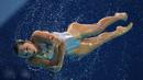 Anggota tim renang indah Tiongkok beraksi di nomor Team Free Combination Kejuaraan Dunia Akuatik 2015 di Kazan, Rusia. (26/7/2015). (AFP PHOTO/Christophe Simon)