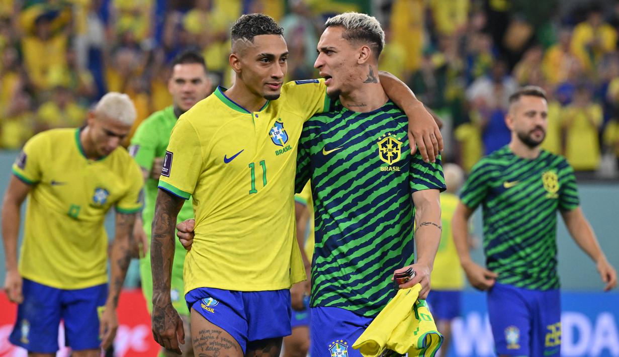 <p>Penyerang Brasil, Raphinha pernah mengungkapkan bahwa timnya sudah menyiapkan berbagai macam goyangan yang akan diperagakan saat mereka mencetak gol. Bukan satu, bukan dua, bukan tiga, tetapi 10 tarian untuk selebrasi gol. (AFP/Nelson Almeida)</p>