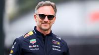 Kepala tim dan CEO Red Bull Racing asal Inggris, Christian Horner, tersenyum di sirkuit Red Bull Ring di Spielberg, Austria, pada 27 Juni 2025, menjelang Grand Prix Formula Satu Austria. (MAX SLOVENCIK/APA/AFP)