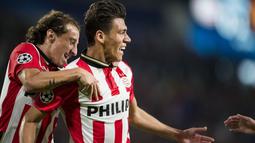 Ekspresi pemain PSV, Hector Moreno setelah mencetak gol ke gawang MU dalam pertandingan Grup B Liga Champions yang berlangsung di Stadion Philips, Eindhoven, Belanda. Selasa (12/9/2015). (AFP Photo/ANP/Olaf Kraak)