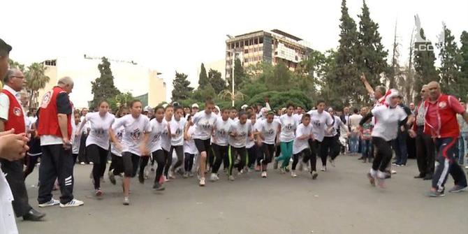 Homs Kembali Damai, Warga Suriah Rayakan Dengan Maraton