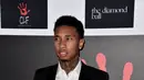 Tyga menilai penampilan Kylie Jenner membosankan. Tyga selalu bilang Kylie Jenner bertubuh gemuk dan lebar, Tyga berharap Kylie segera operasi sedot lemak dan penambahan implan pada bagian bokong agar terlihat lebih sintal. (AFP/Bintang.com)