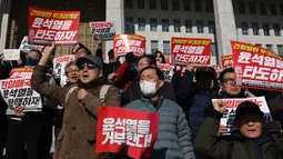 Sebelumnya, Presiden Yoon Suk Yeol pada Selasa (3/12/2024) malam, melakukan upaya untuk memberlakukan undang-undang darurat militer pertama di Korea Selatan dalam lebih dari empat dekade terakhir. (ANTHONY WALLACE/AFP)