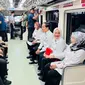 Presiden Joko Widodo atau Jokowi kembali menjajal moda transportasi light rail transit (LRT) Jakarta, Bogor, Depok, Bekasi (Jabodebek) di Statiun Cawang, Jakarta. (Setpres)