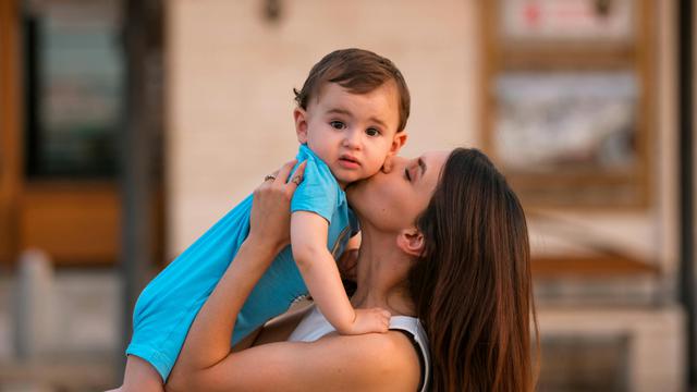 Showering their children with affection and praise