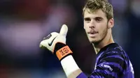 Gestur kiper Atletico Madrid David de Gea dalam sebuah pertandingan Europa League di Vicente Calderon, Madrid. AFP PHOTO/PIERRE-PHILIPPE MARCOU